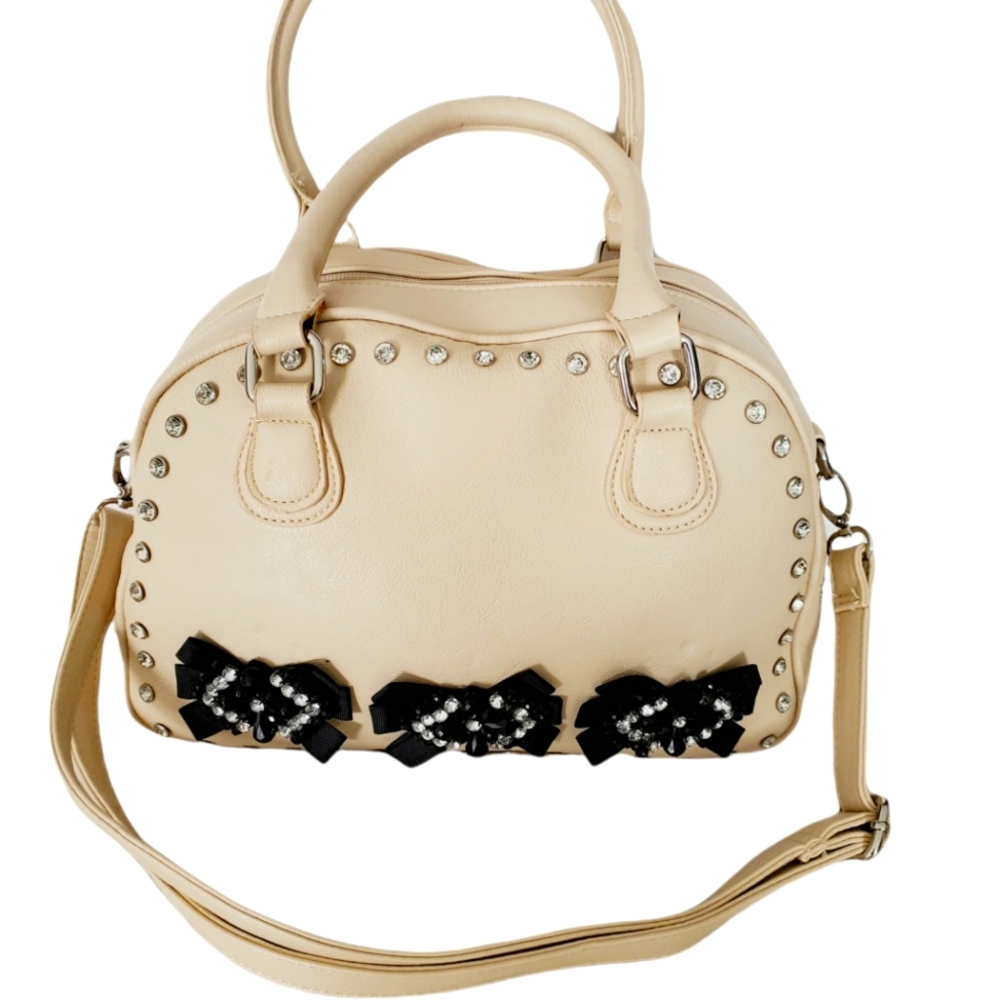 - Elegant Cream Handbag with Black Accents